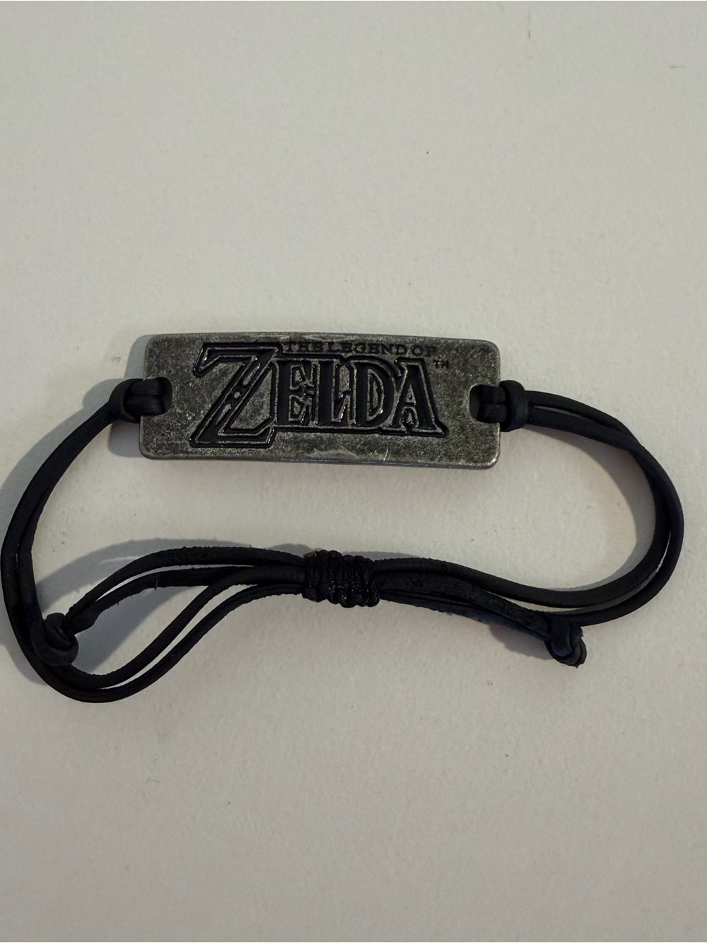 Nintendo bracelet The Legend of Zelda, metal silver & black cord official unisex